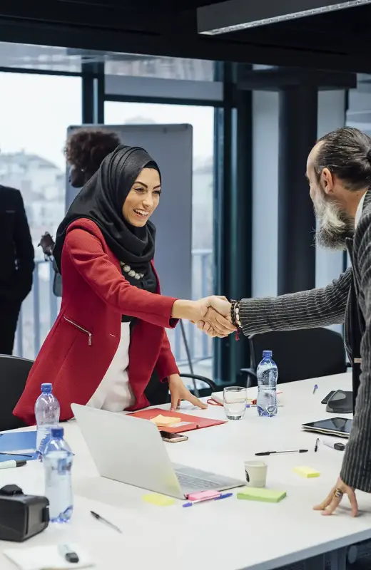 business-partners-shaking-hands-at-meeting-in-offi-2025-04-04-15-48-11-utc